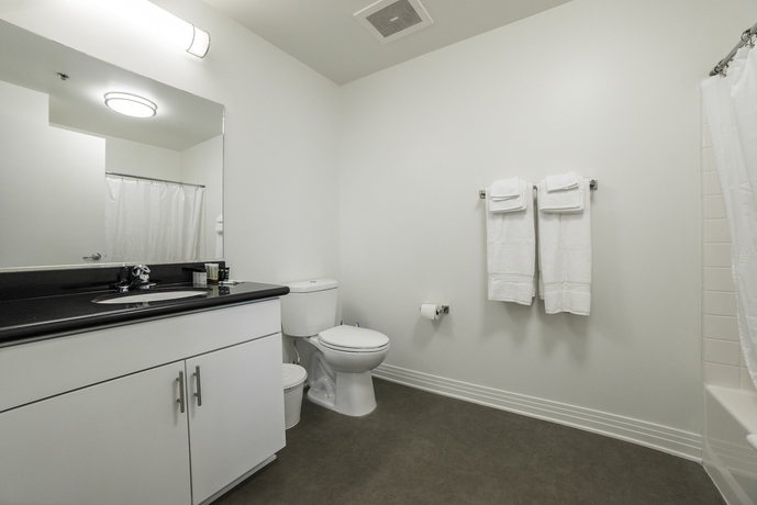 Imagen de la habitación del Hotel Ginosi Metropolitan Apartel. Foto 6