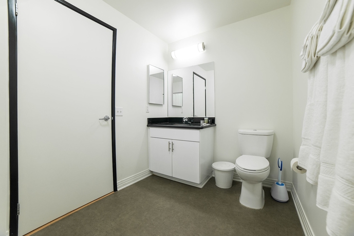 Imagen de la habitación del Hotel Ginosi Metropolitan Apartel. Foto 7