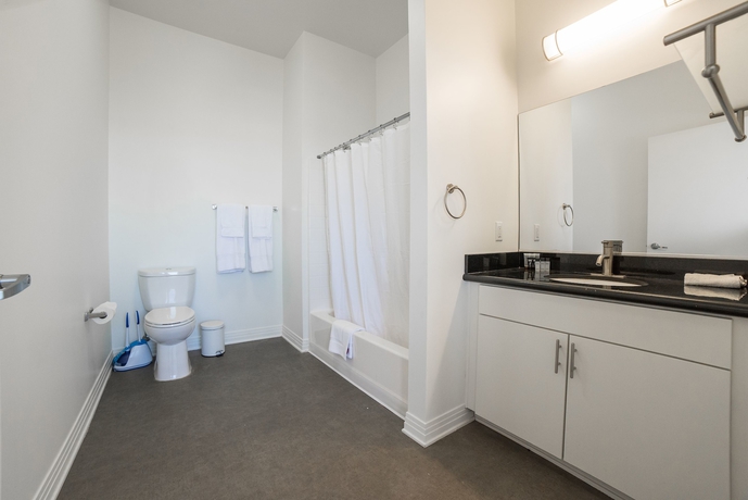 Imagen de la habitación del Hotel Ginosi Metropolitan Apartel. Foto 8