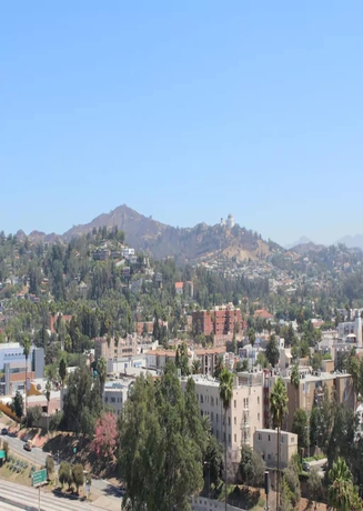 Imagen de la habitación del Hotel Ginosi Metropolitan Apartel. Foto 9