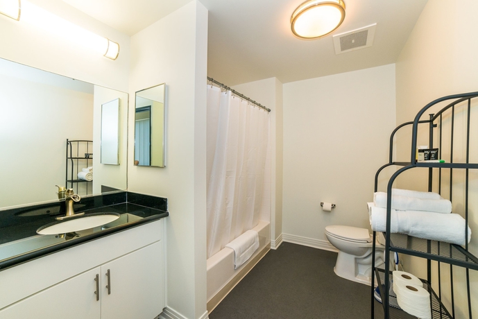 Imagen de la habitación del Hotel Ginosi Metropolitan Apartel. Foto 11