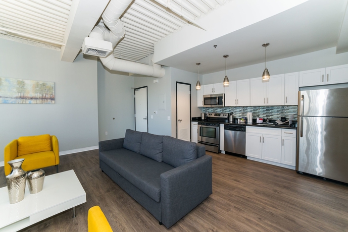 Imagen de la habitación del Hotel Ginosi Metropolitan Apartel. Foto 12