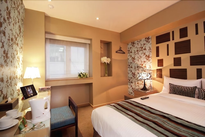 Imagen de la habitación del Hotel Ginza. Foto 13