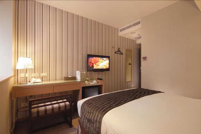 Imagen de la habitación del Hotel Ginza. Foto 16