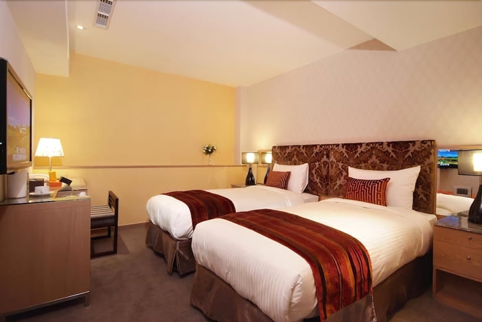Imagen de la habitación del Hotel Ginza. Foto 17