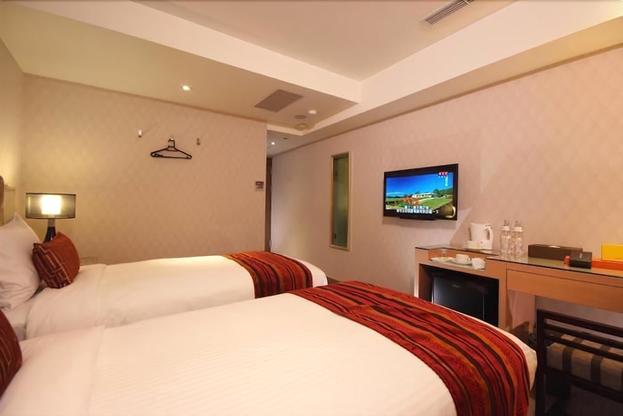 Imagen de la habitación del Hotel Ginza. Foto 18