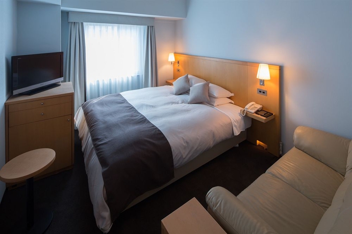 Imagen de la habitación del Hotel Ginza Grand. Foto 8