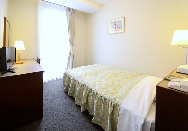 Imagen de la habitación del Hotel Ginza International. Foto 10