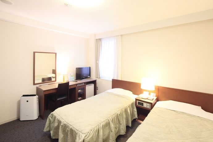 Imagen de la habitación del Hotel Ginza International. Foto 11