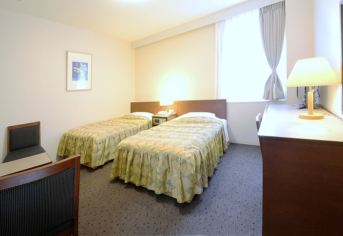 Imagen de la habitación del Hotel Ginza International. Foto 13