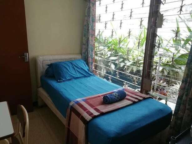 Imagen de la habitación del Hotel Gio Guesthouse Bogor. Foto 19