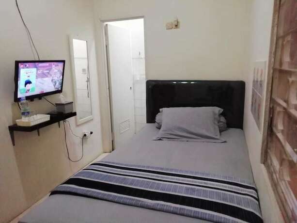 Imagen de la habitación del Hotel Gio Guesthouse Bogor. Foto 21