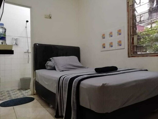 Imagen de la habitación del Hotel Gio Guesthouse Bogor. Foto 25