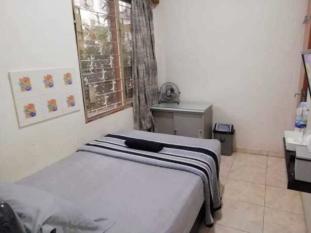 Imagen de la habitación del Hotel Gio Guesthouse Bogor. Foto 28