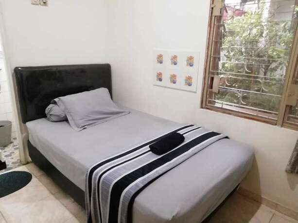 Imagen de la habitación del Hotel Gio Guesthouse Bogor. Foto 29