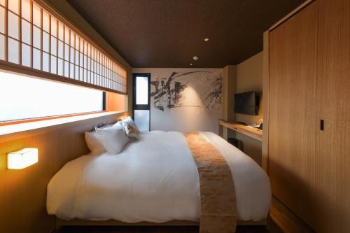 Imagen de la habitación del Hotel Gion Misen. Foto 9