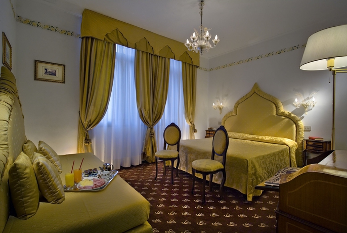 Imagen de la habitación del Hotel Giorgione. Foto 11
