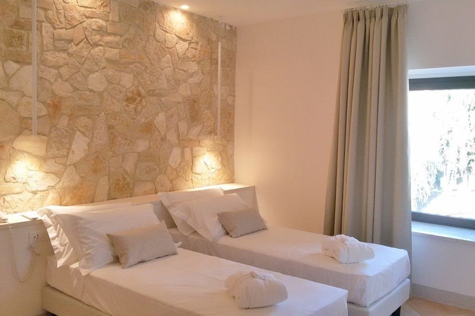 Imagen de la habitación del Hotel Giotto Luxury Country House. Foto 4