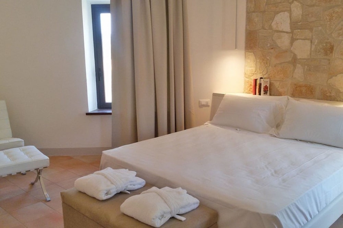 Imagen de la habitación del Hotel Giotto Luxury Country House. Foto 5