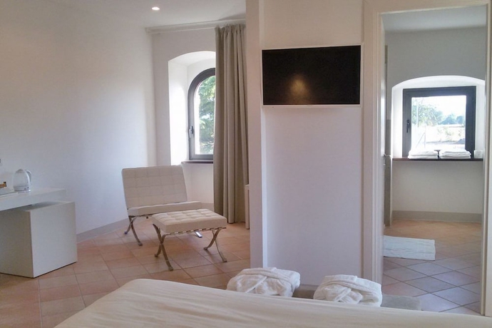 Imagen de la habitación del Hotel Giotto Luxury Country House. Foto 8