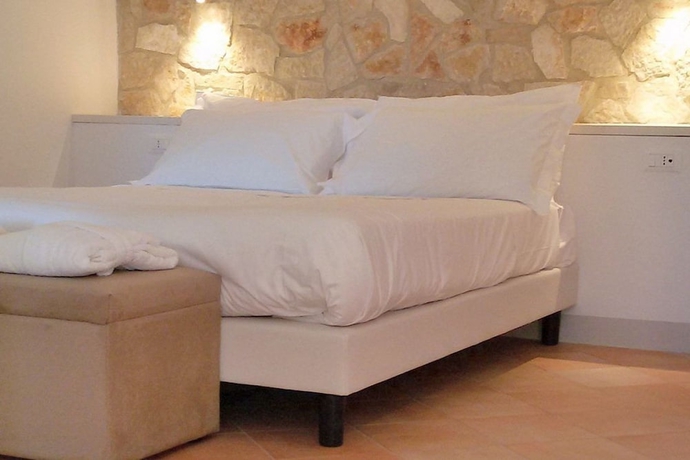Imagen de la habitación del Hotel Giotto Luxury Country House. Foto 9