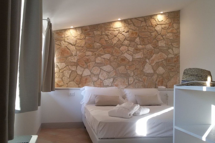 Imagen de la habitación del Hotel Giotto Luxury Country House. Foto 11