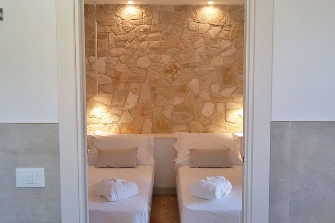 Imagen de la habitación del Hotel Giotto Luxury Country House. Foto 12