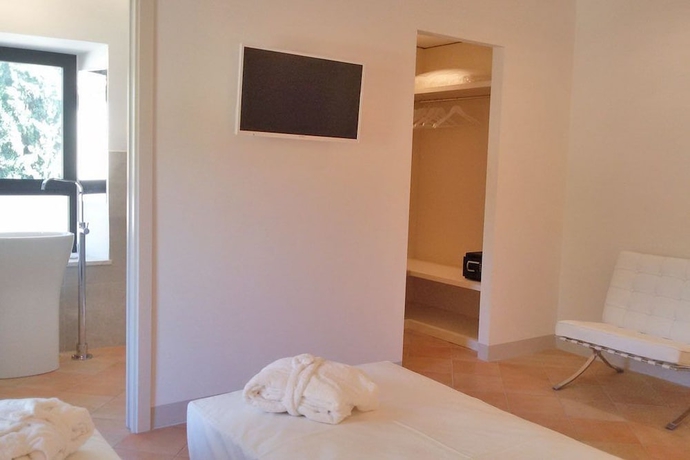 Imagen de la habitación del Hotel Giotto Luxury Country House. Foto 14