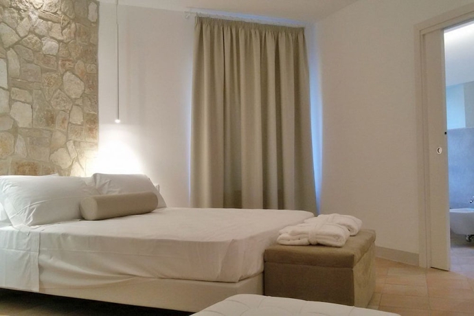 Imagen de la habitación del Hotel Giotto Luxury Country House. Foto 16