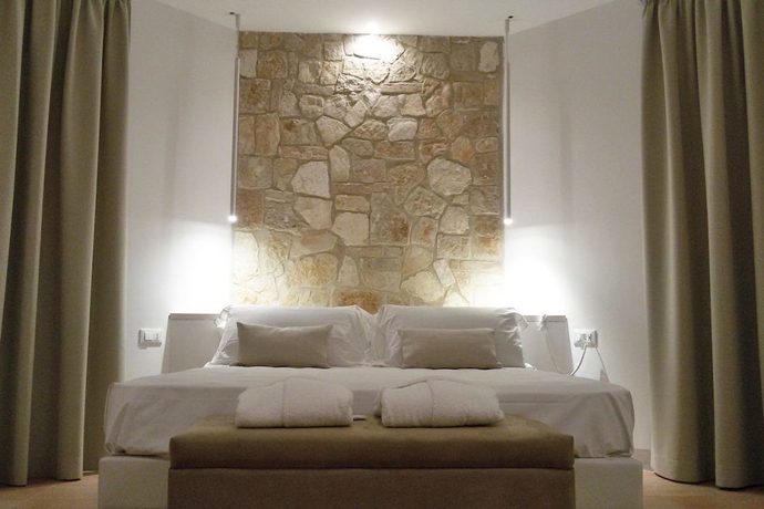 Imagen de la habitación del Hotel Giotto Luxury Country House. Foto 17