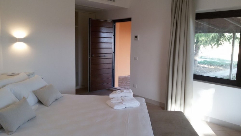 Imagen de la habitación del Hotel Giotto Luxury Country House. Foto 19