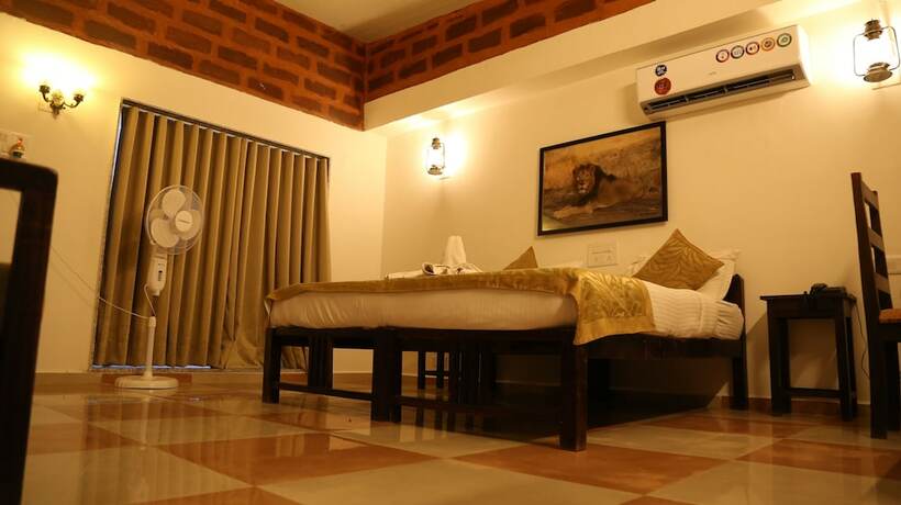 Imagen de la habitación del Hotel Gir Lions Paw Resort With Swimming Pool. Foto 15