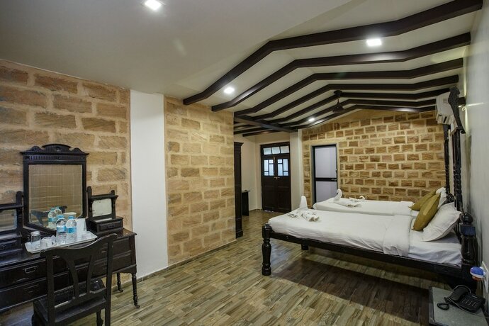 Imagen de la habitación del Hotel Gir Lions Paw Resort With Swimming Pool. Foto 17
