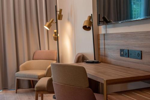 Imagen de la habitación del Hotel Giralda Center. Foto 7