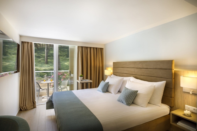 Imagen de la habitación del Hotel Girandella Valamar Collection Resort. Foto 4