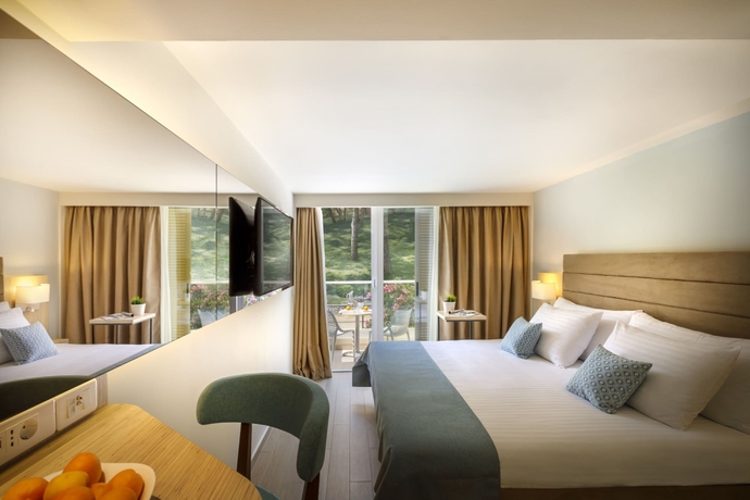 Imagen de la habitación del Hotel Girandella Valamar Collection Resort. Foto 8