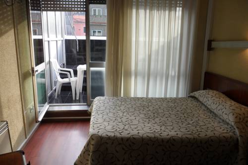 Imagen de la habitación del Hotel Girassol. Foto 10