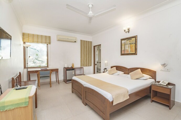 Imagen de la habitación del Hotel Girisadan Homestay. Foto 17