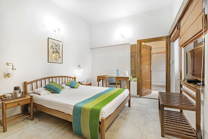 Imagen de la habitación del Hotel Girisadan Homestay. Foto 18