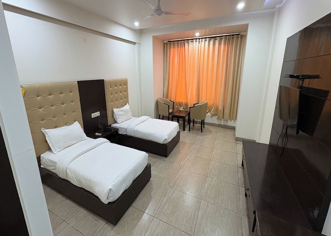 Imagen de la habitación del Hotel Girraj Inn. Foto 3
