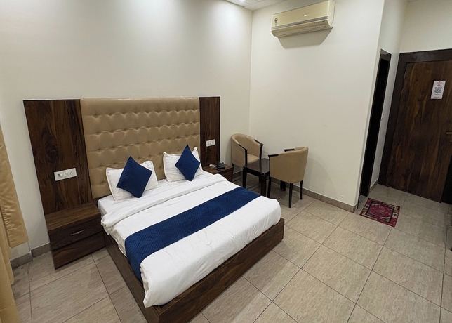 Imagen de la habitación del Hotel Girraj Inn. Foto 5