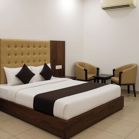 Imagen de la habitación del Hotel Girraj Inn. Foto 9