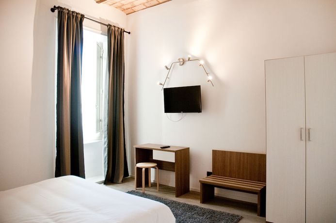 Imagen de la habitación del Hotel Giuturna Boutique. Foto 9