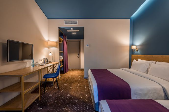 Imagen de la habitación del Hotel Gladius Inn. Foto 5