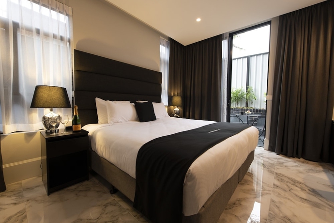 Imagen de la habitación del Hotel Gladius & Suites-Parramatta Marsden Street. Foto 1