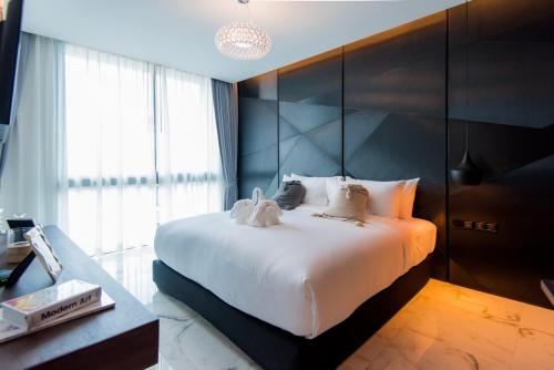 Imagen de la habitación del Hotel Glam Habitat. Foto 7