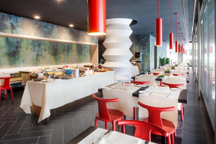 Imagen del bar/restaurante del Hotel Glam Milano. Foto 3