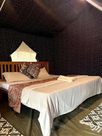 Imagen de la habitación del Hotel GlampInn Woods. Foto 1