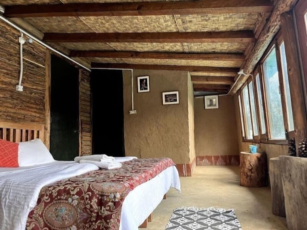 Imagen de la habitación del Hotel GlampInn Woods. Foto 4