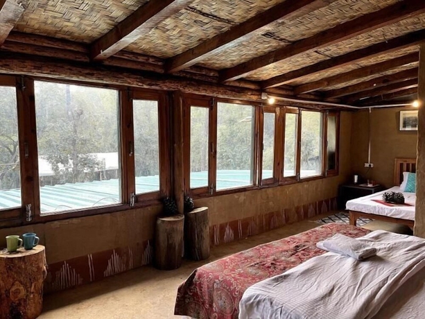 Imagen de la habitación del Hotel GlampInn Woods. Foto 7